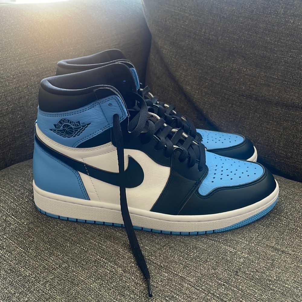 Mens black and baby blue size 9 run a little big brand  new Nike air Jordan 1’s